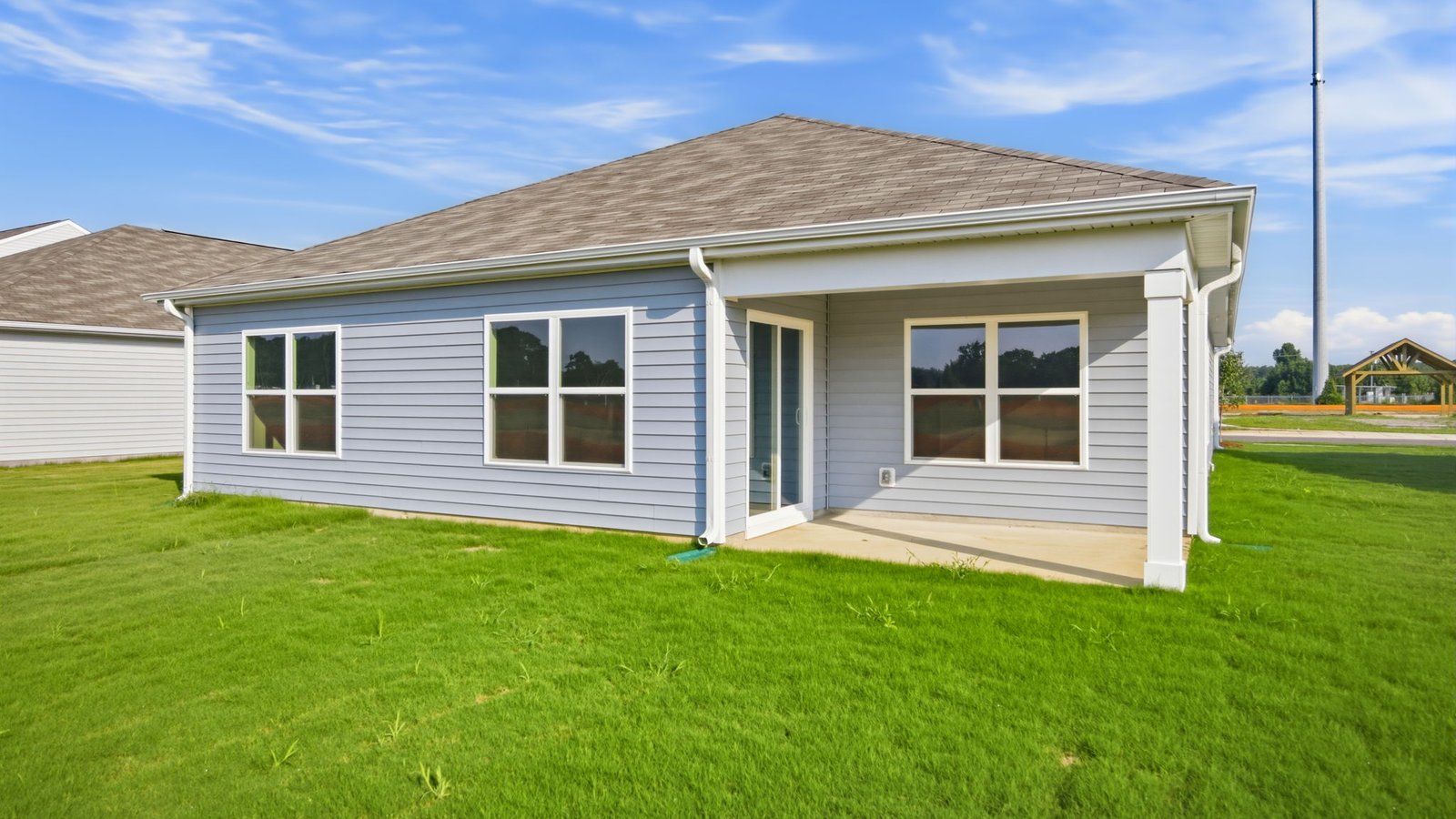 rear view with covered patio
