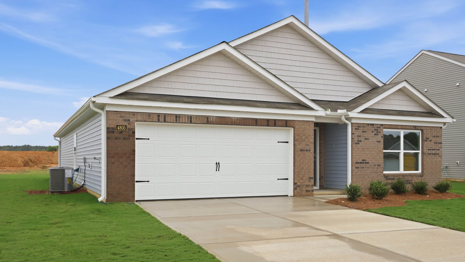 two car garage and drive way