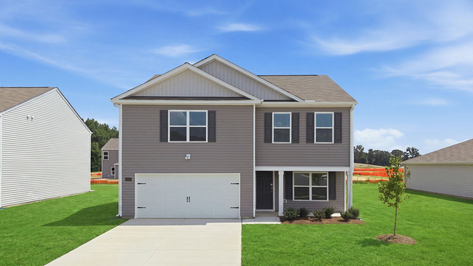 front view of vinyl exterior two story home