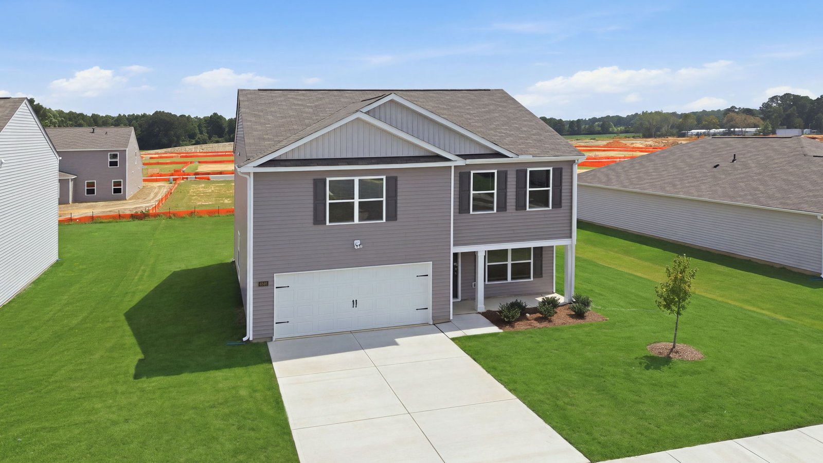aerial view of home and lot