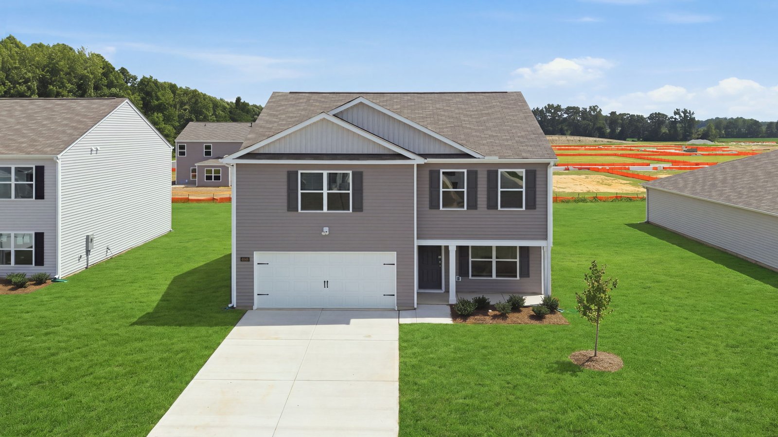 aerial view of home and lot
