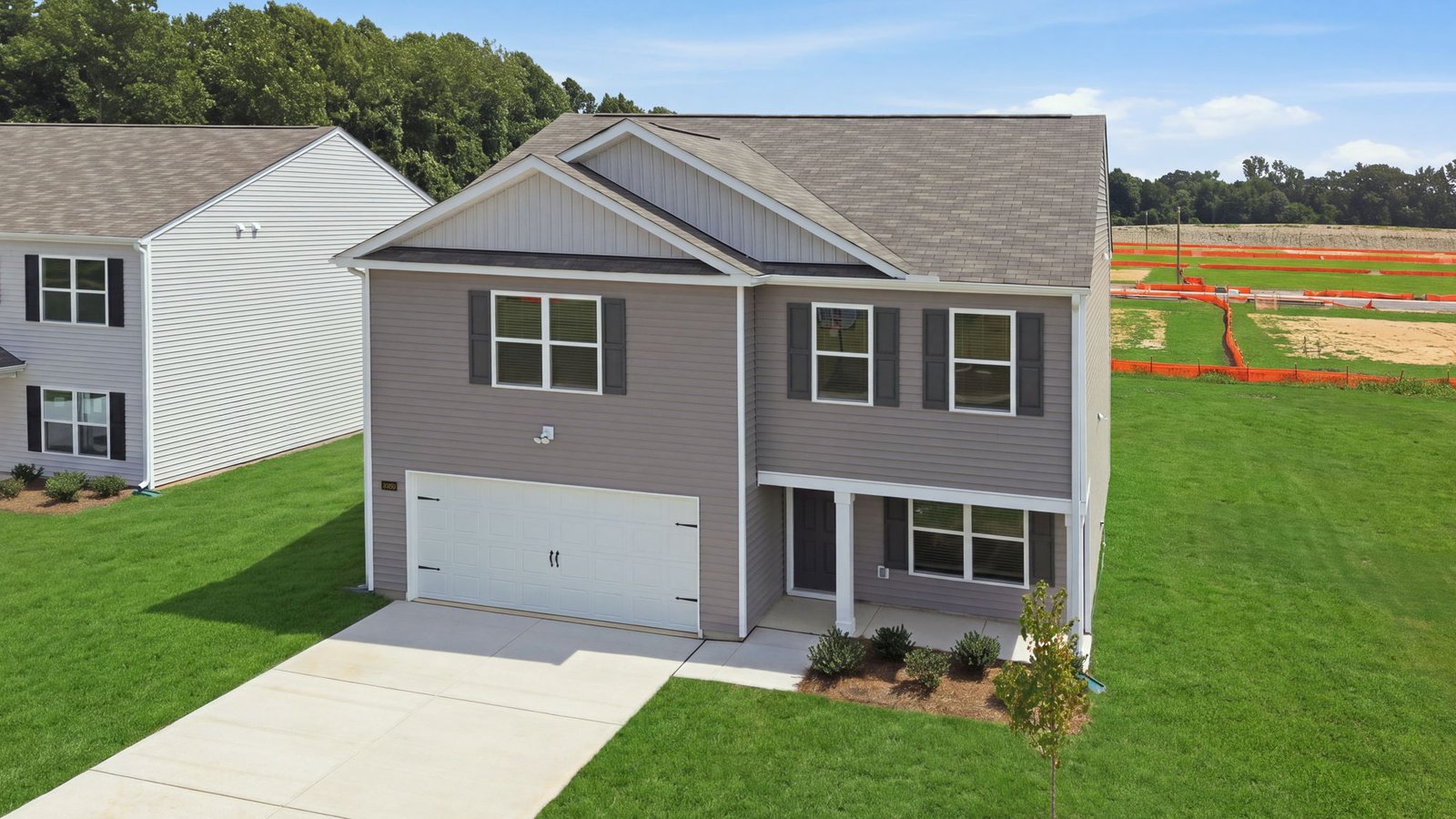 aerial view of home and lot