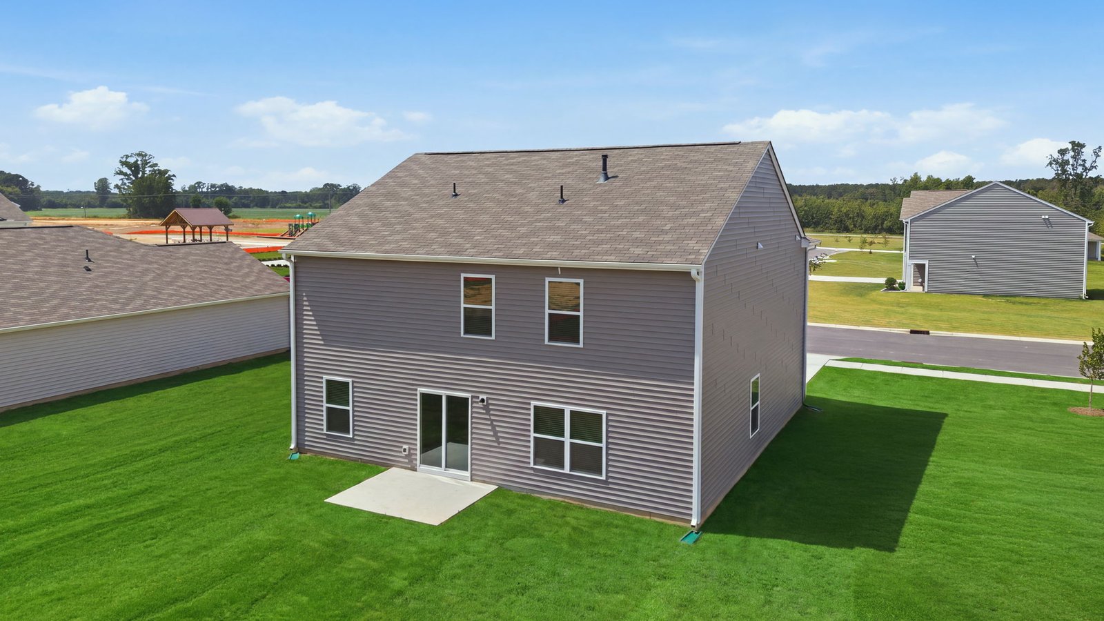 aerial view of home and lot