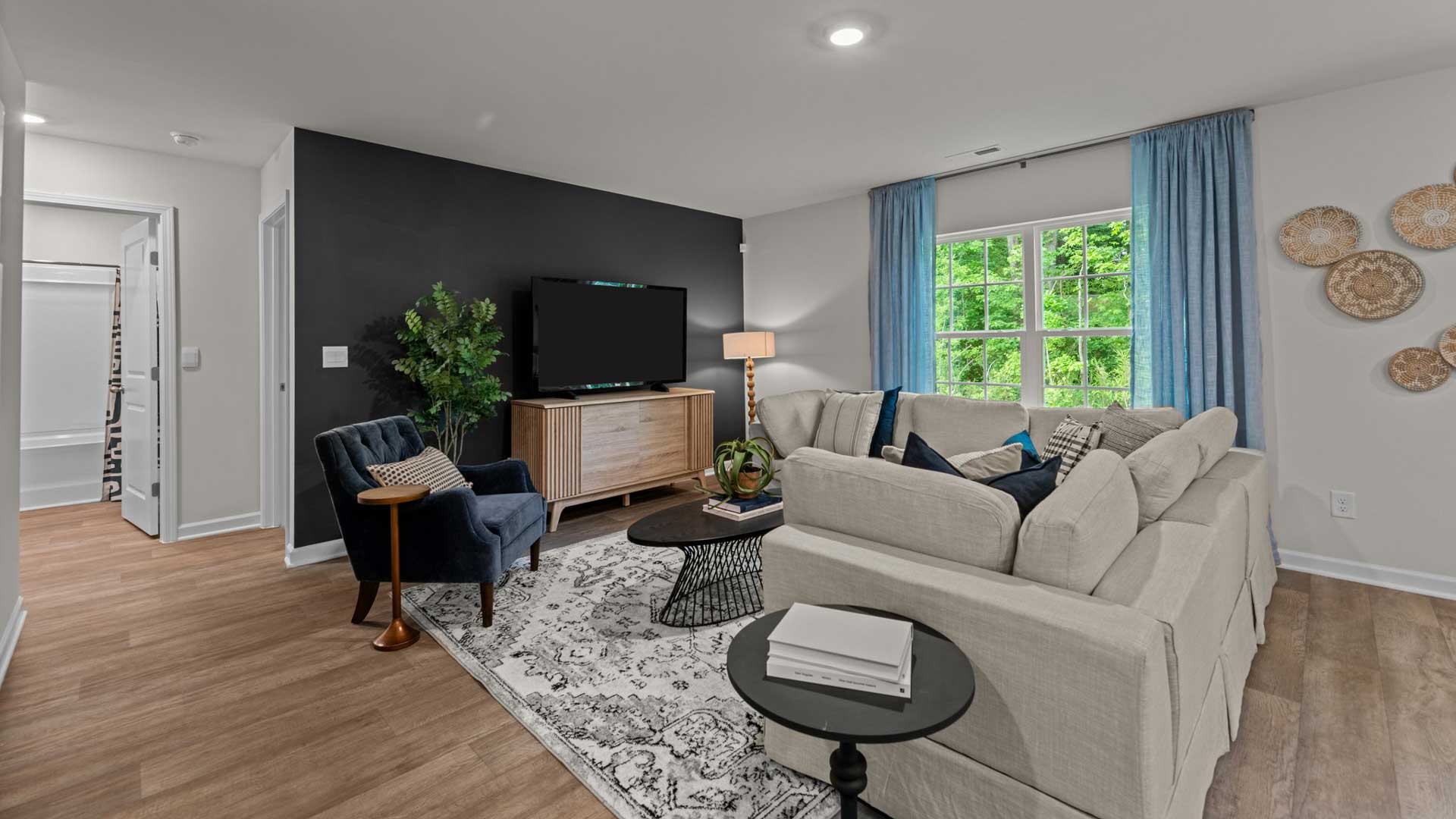 large living room with windows