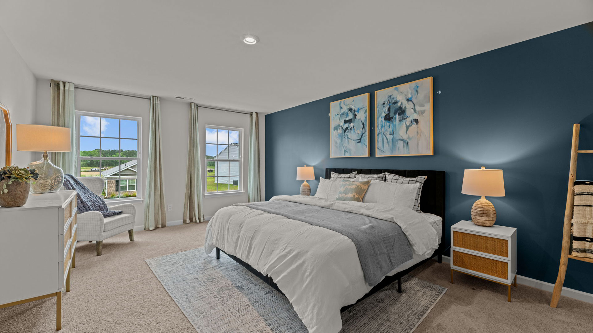 primary bedroom with large windows