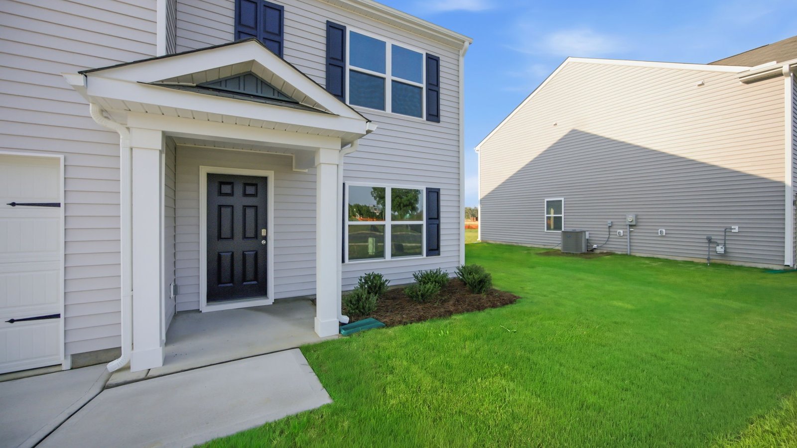 covered front porch of two story home
