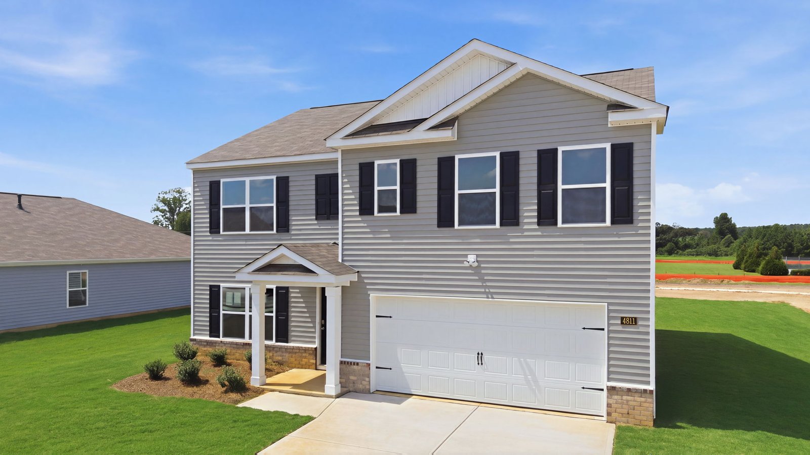 exterior of home two story with two car garage