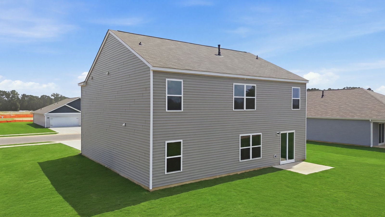rear view of home with back yard and back patio pad rear view of home with back yard and back patio pad