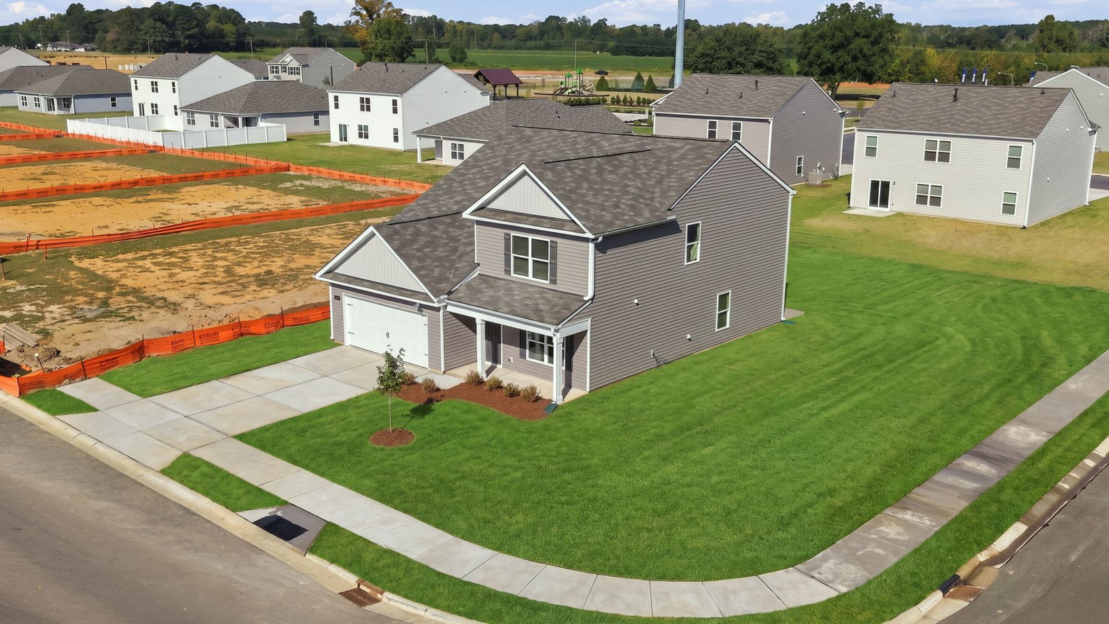 aerial view of home and lot