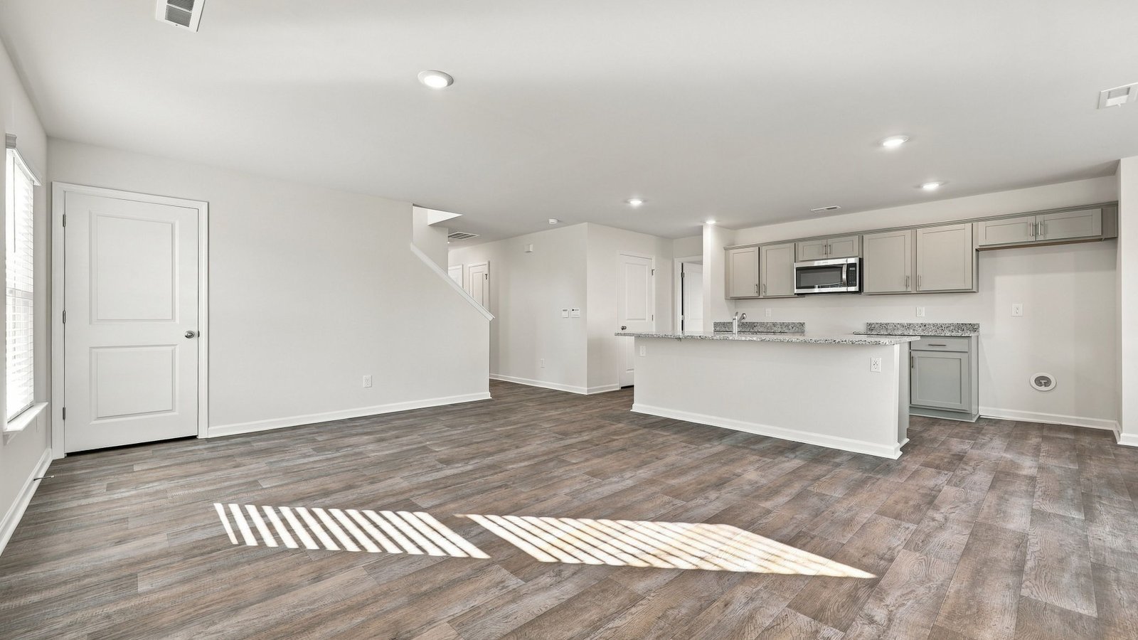 open concept living and dining and kitchen