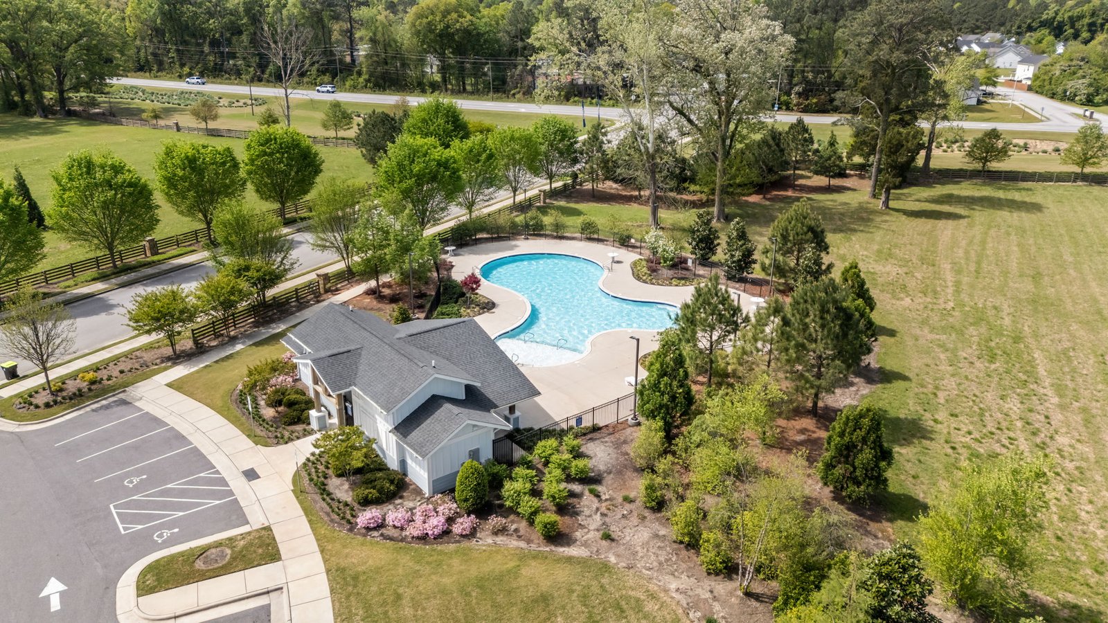 view of pool and pool house