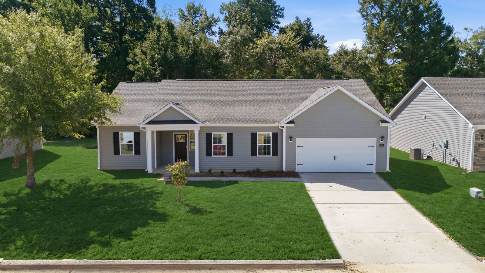 one story ranch home with two car garage