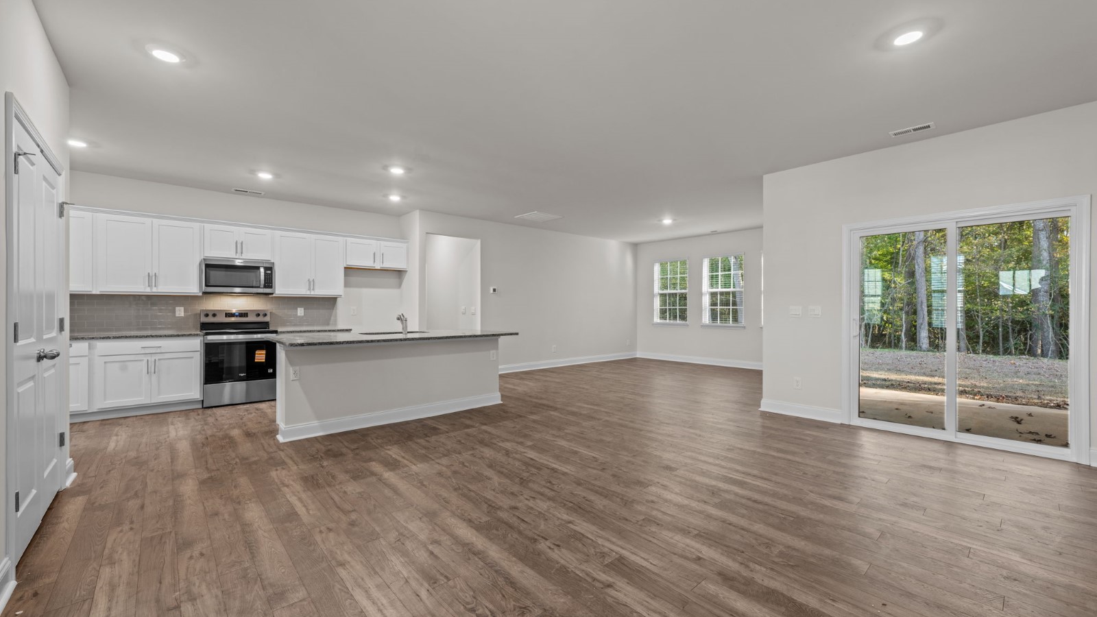 open concept living area with view of kitchen