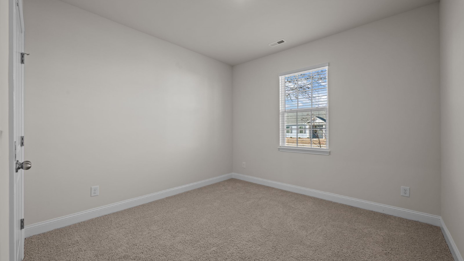 bedroom view with window