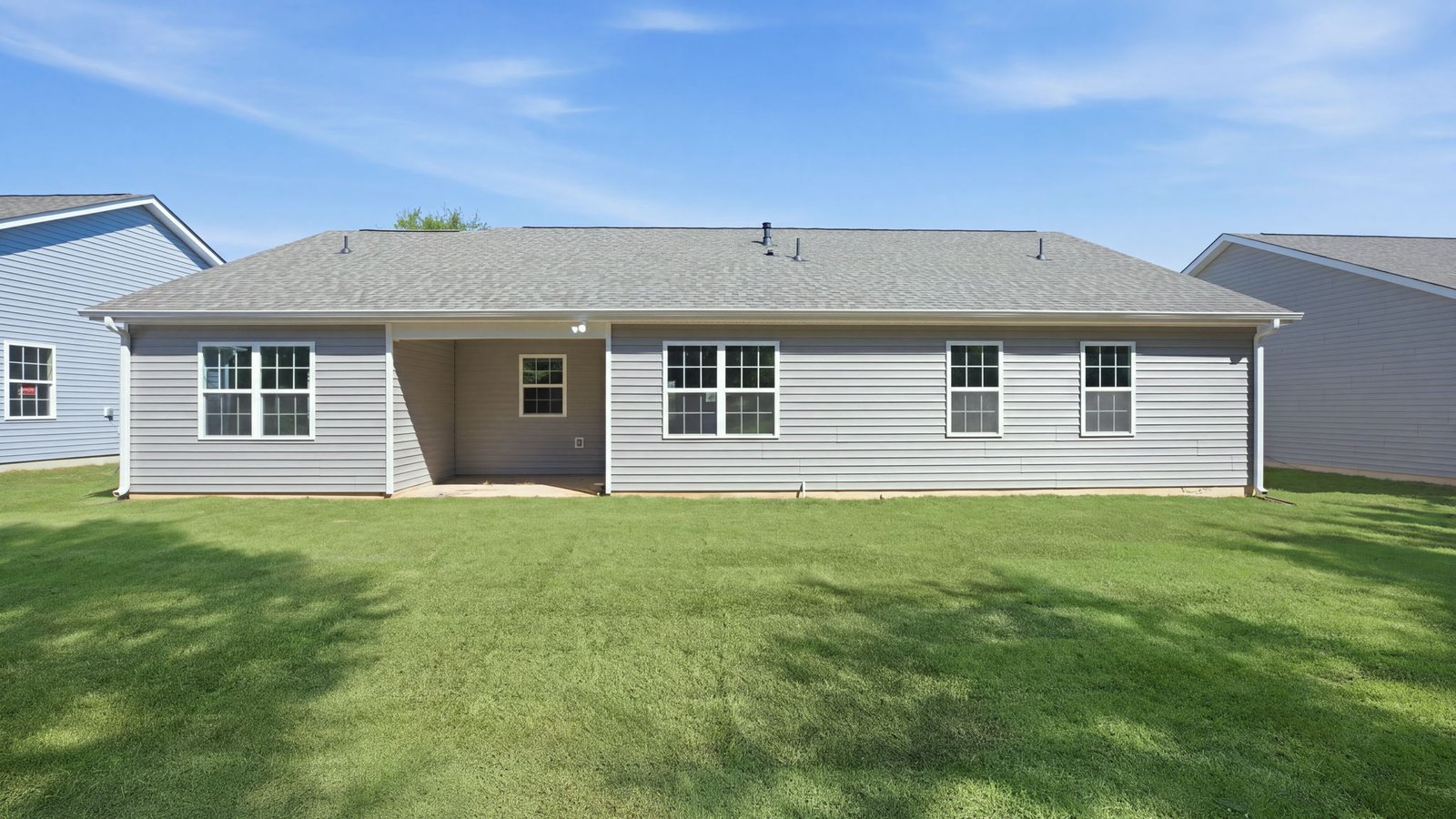 rear view of home and back yard