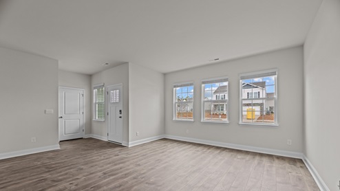 living room with revwood flooring