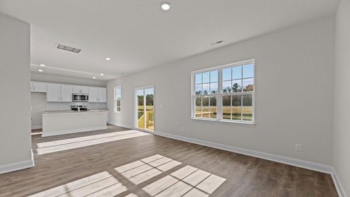 living room with ample lighting