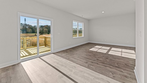 living room with ample lighting