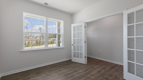Office with double hung french doors