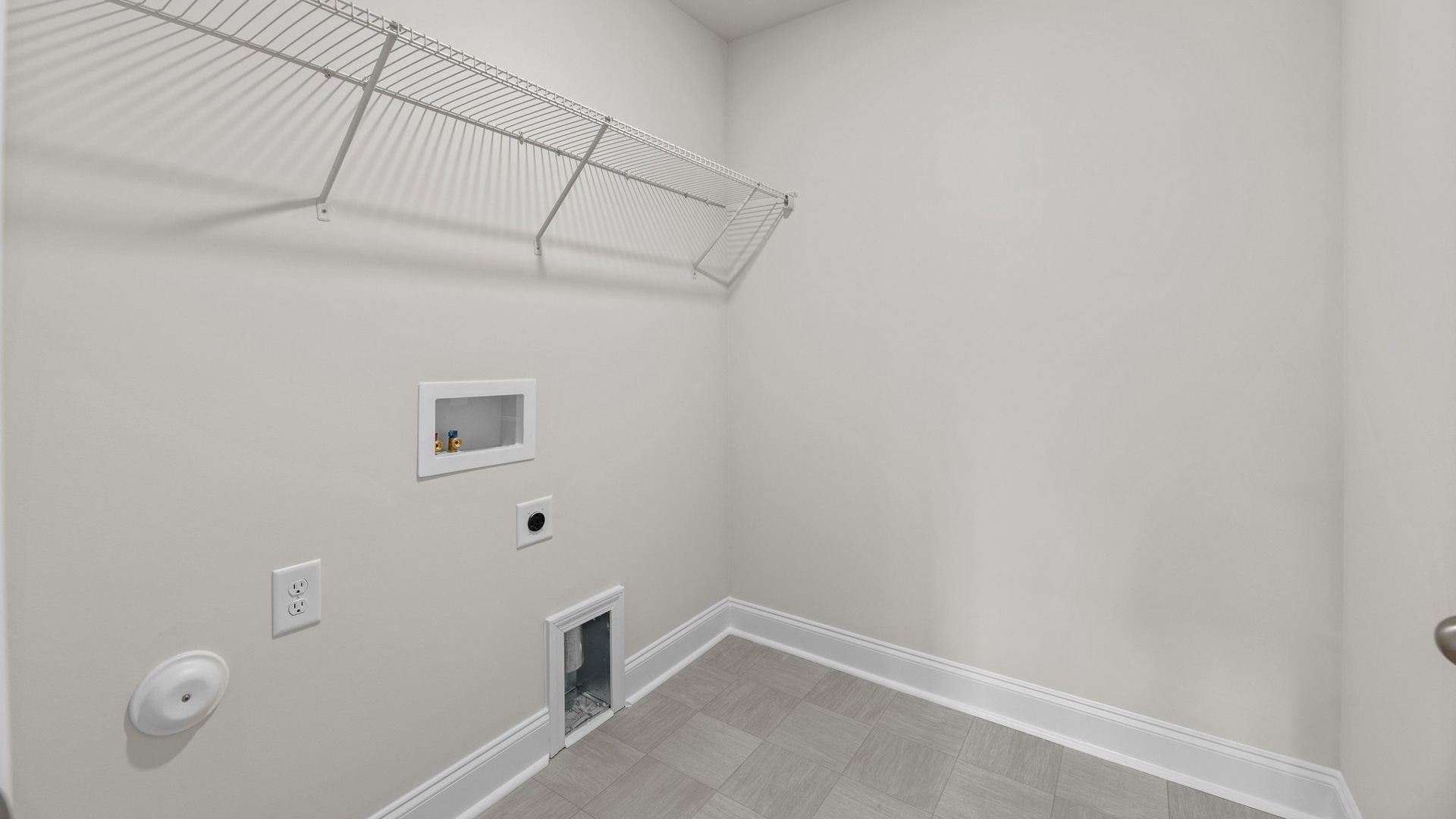 Laundry room with wire shelving