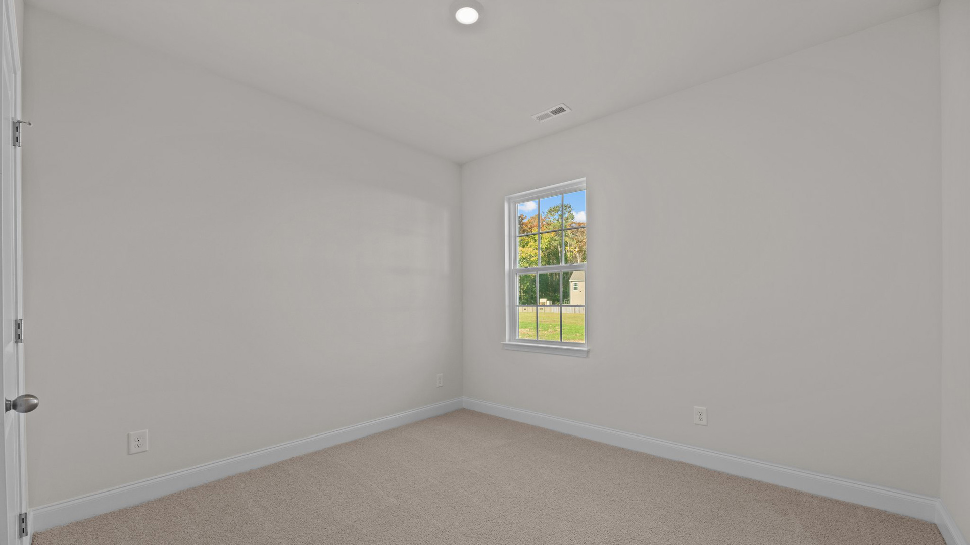 Bedroom with carpet flooring