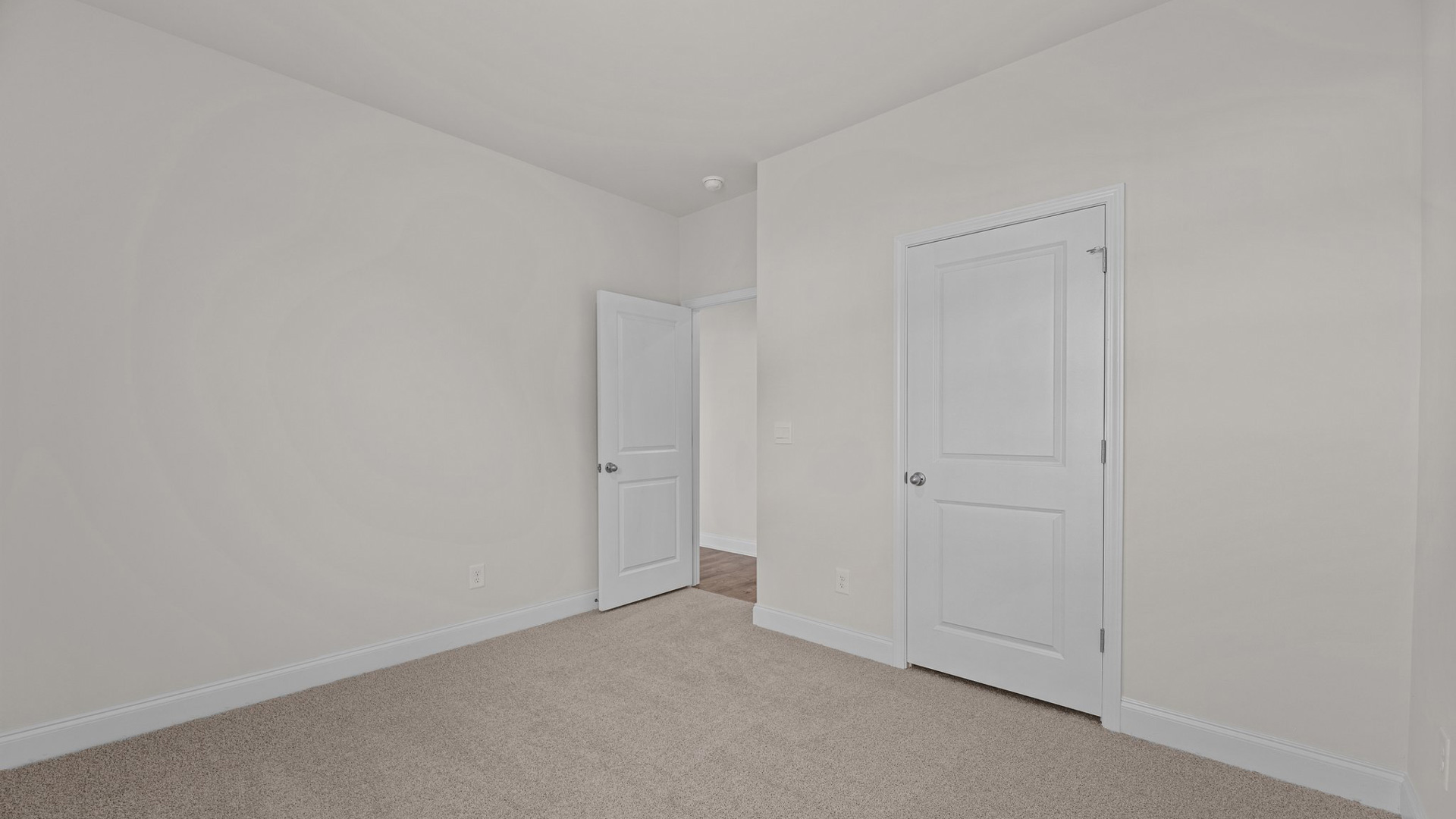 Bedroom with carpet flooring