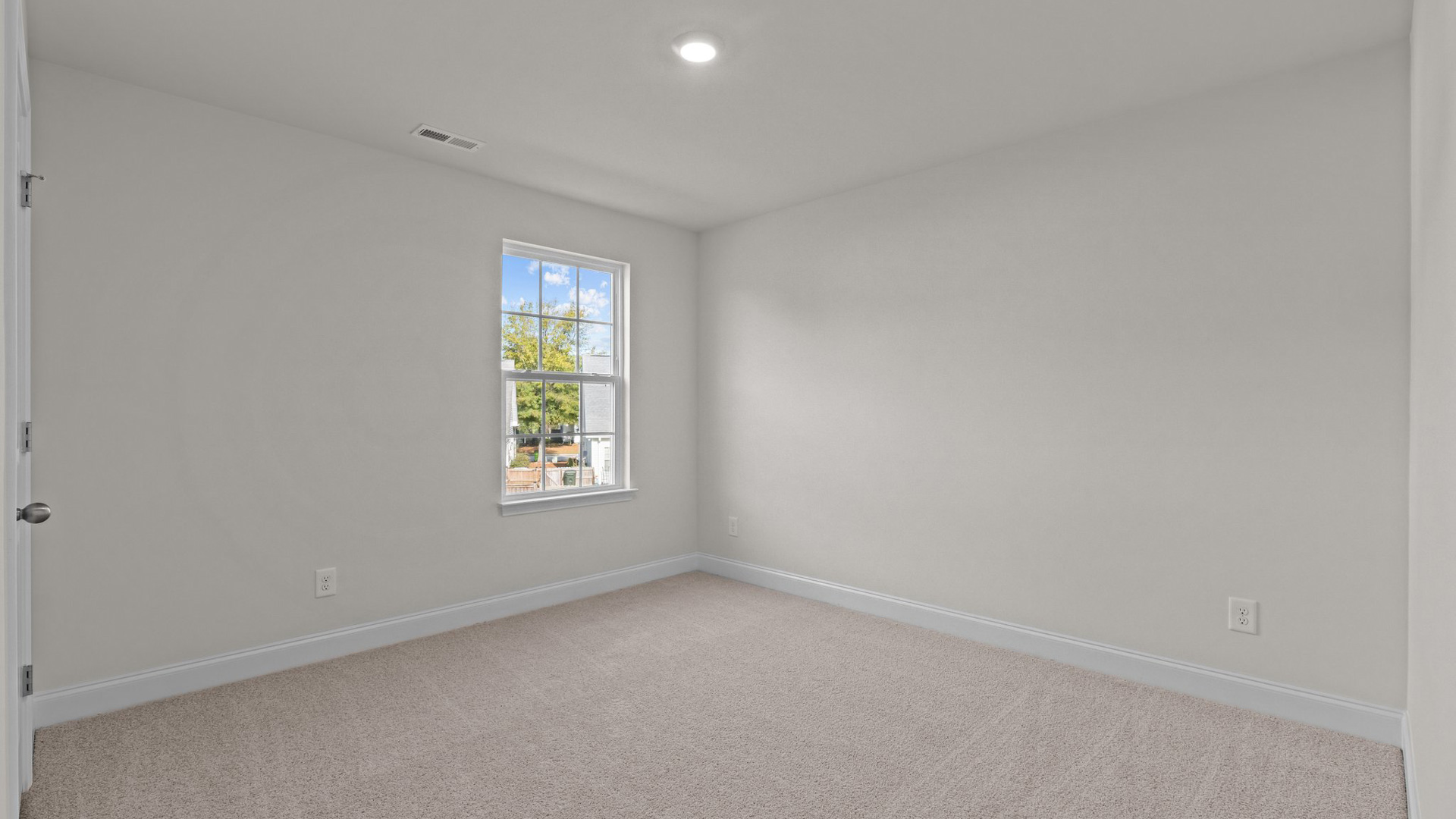 Loft with carpet flooring