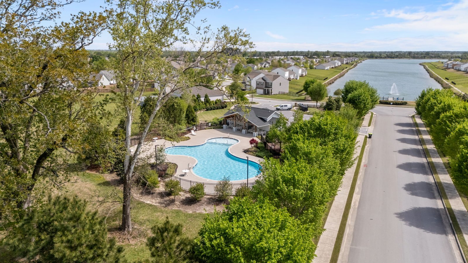 entrance view with lake and pool
