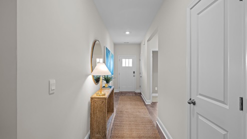 Foyer with rewvwood flooring