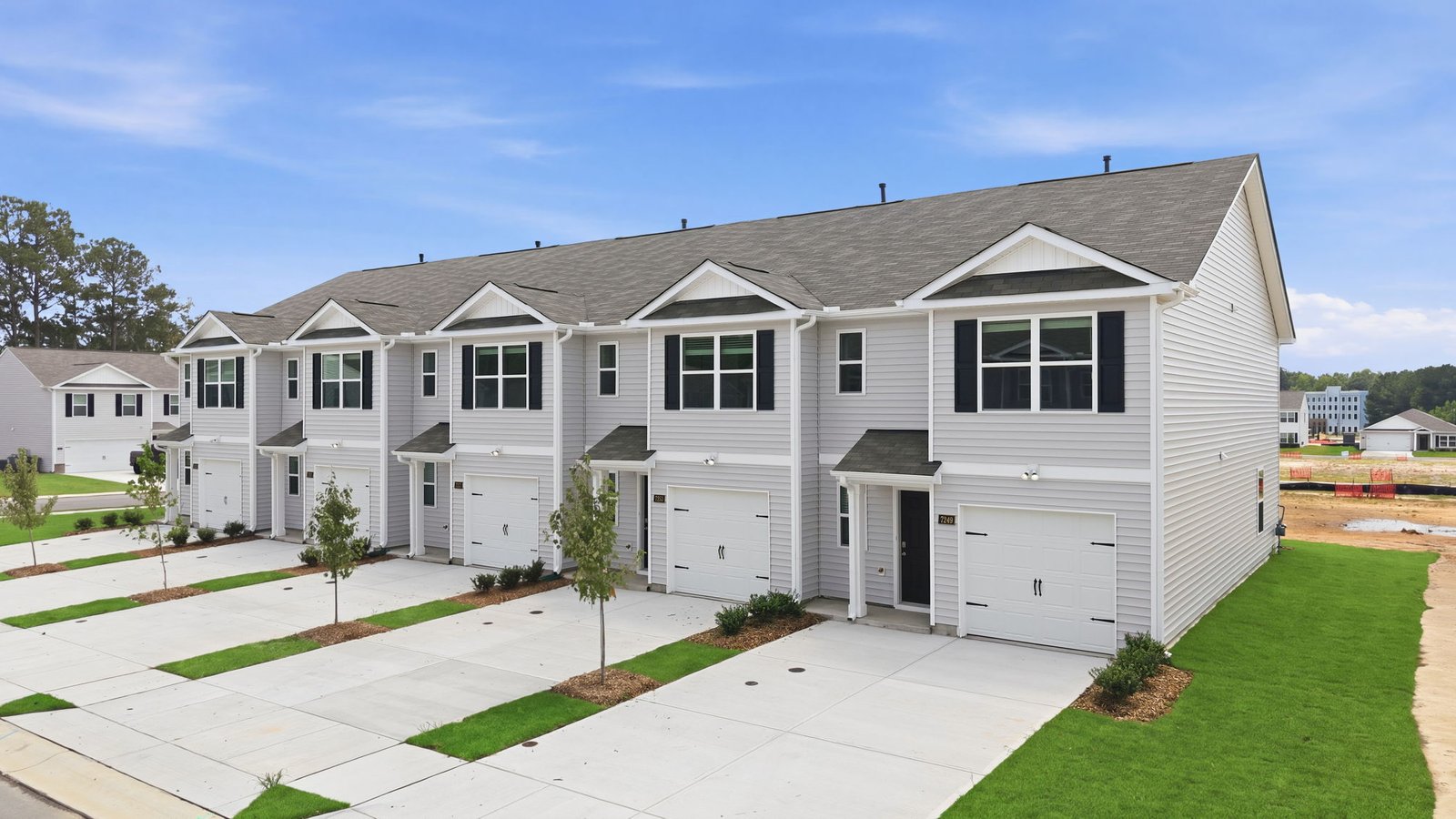exterior view of townhome two story with garage