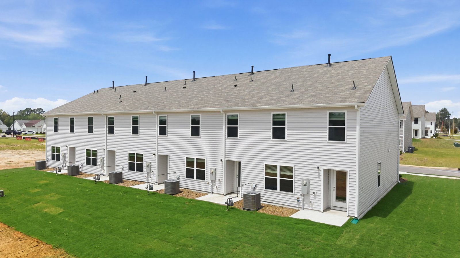 exterior view of townhome two story with garage