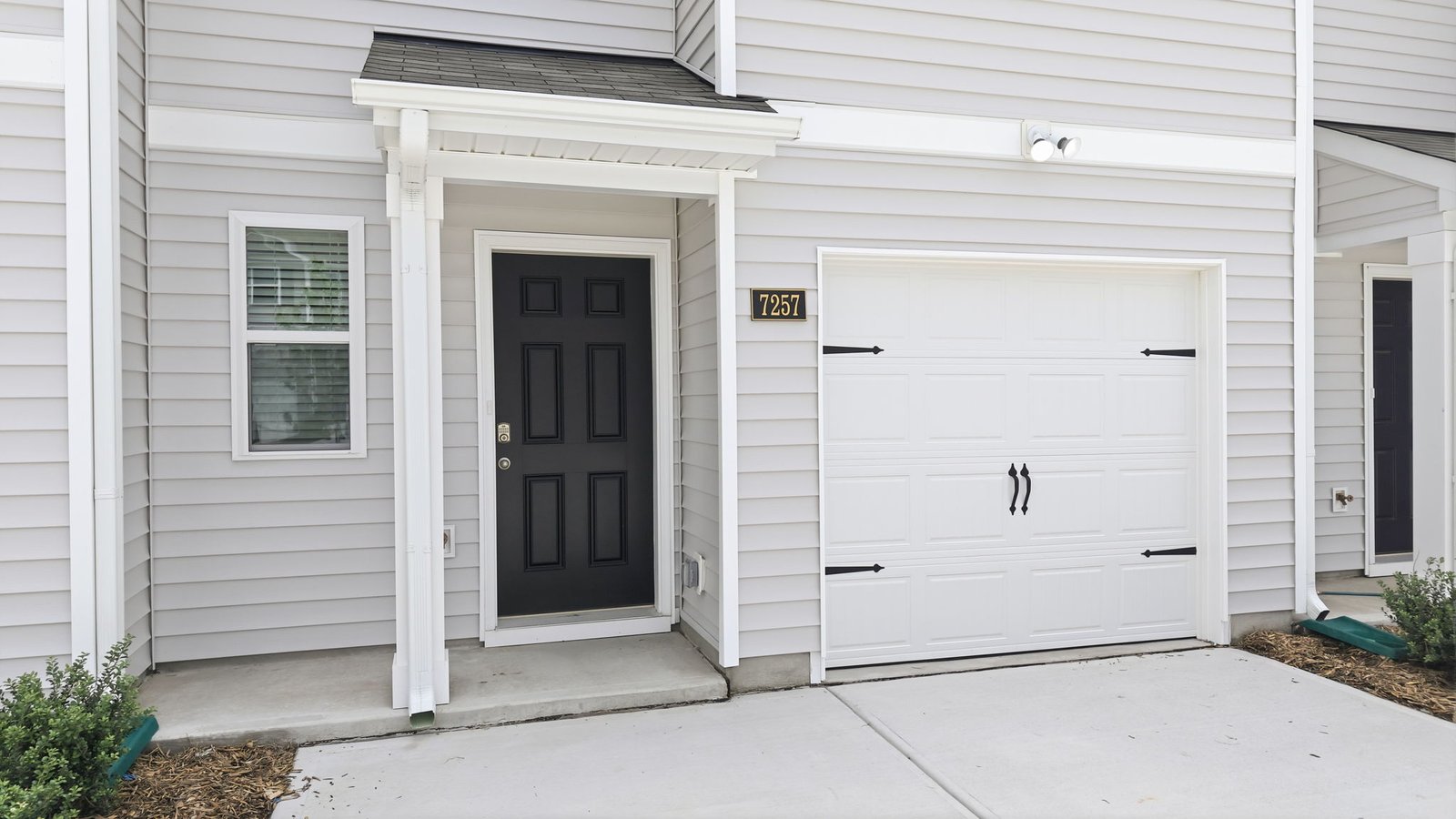 exterior view of townhome two story with garage