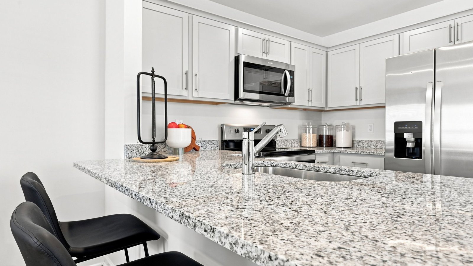 kitchen view with barstools
