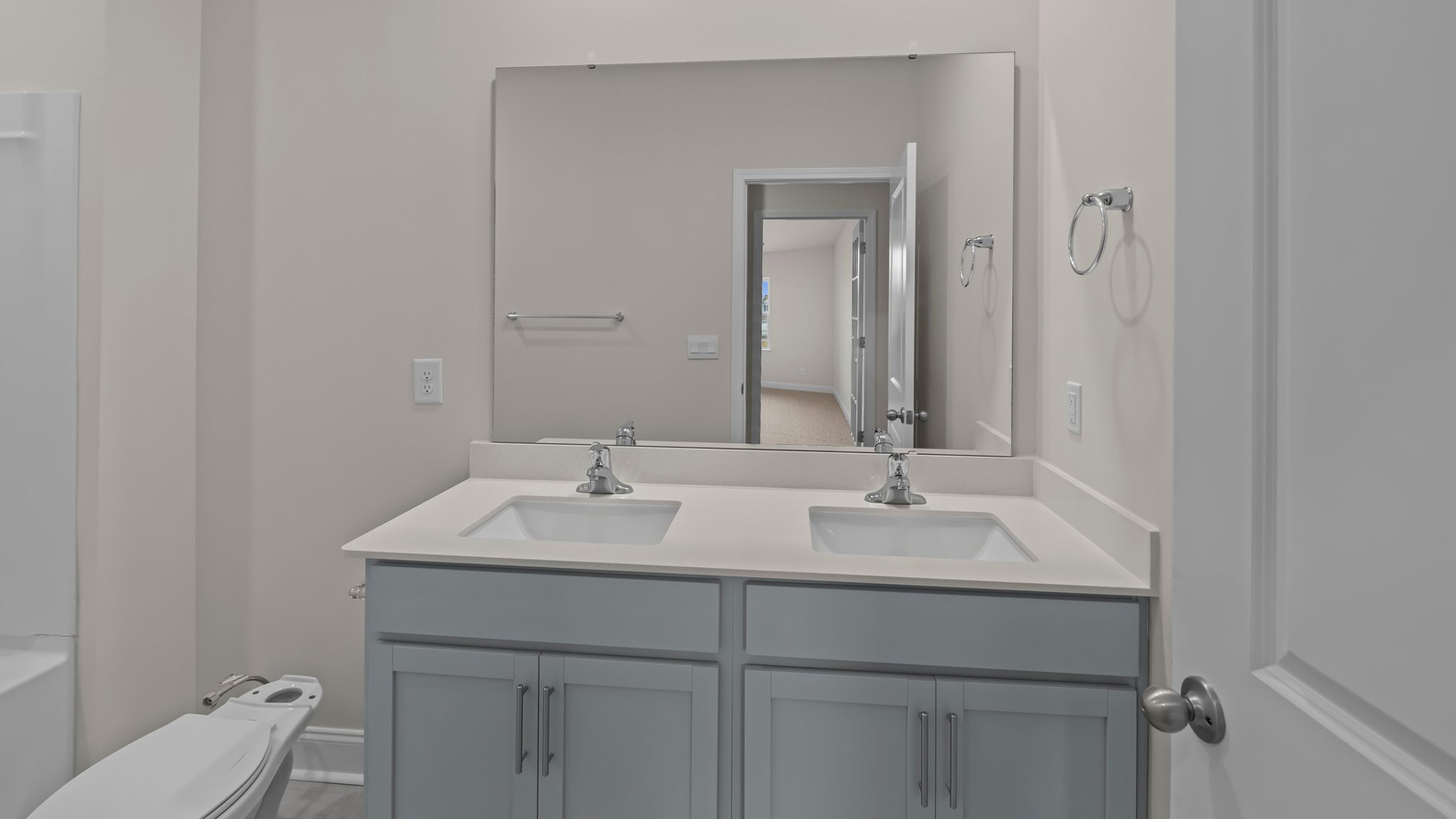 bathroom with quartz counters