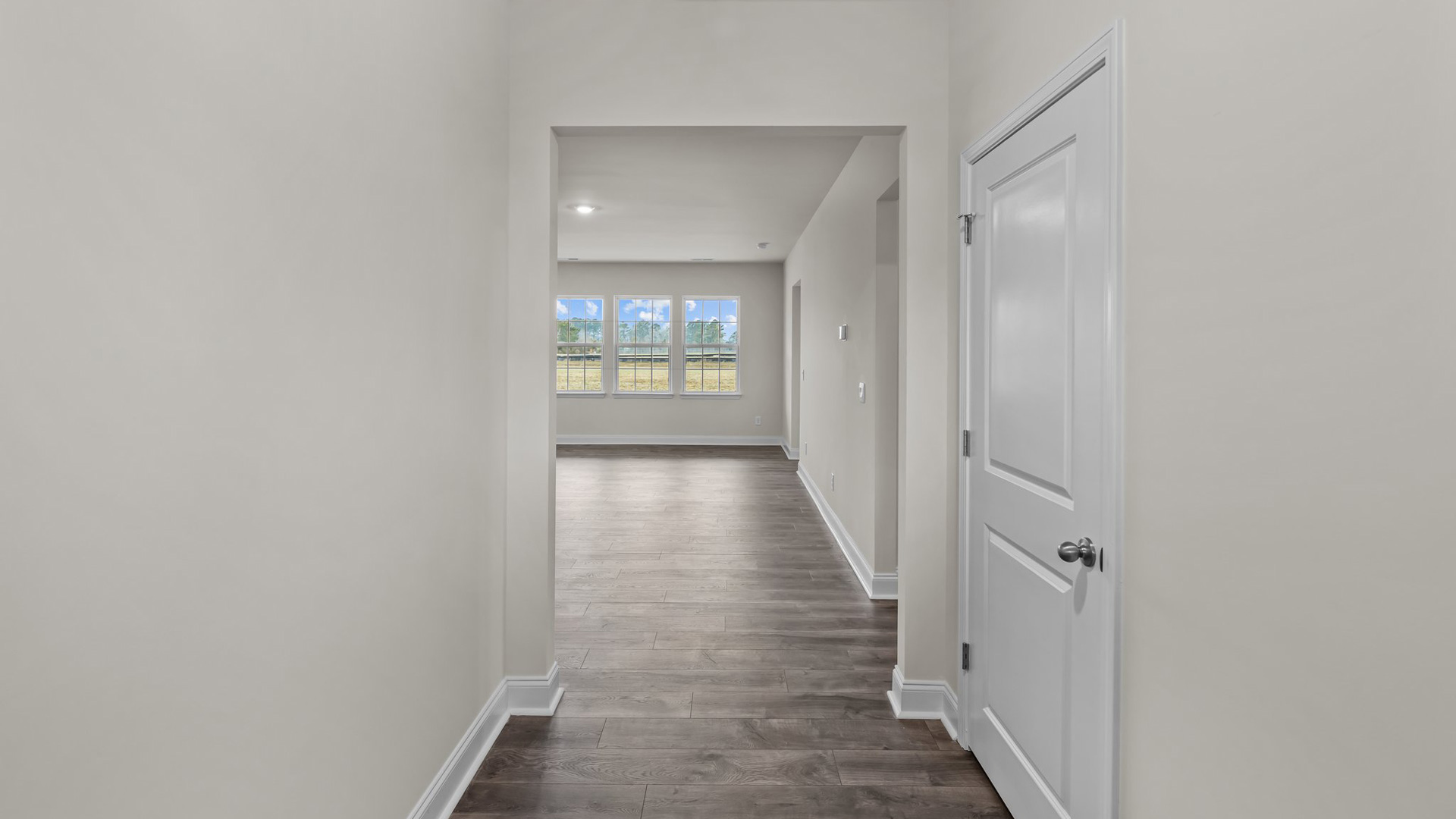 entryway with white door
