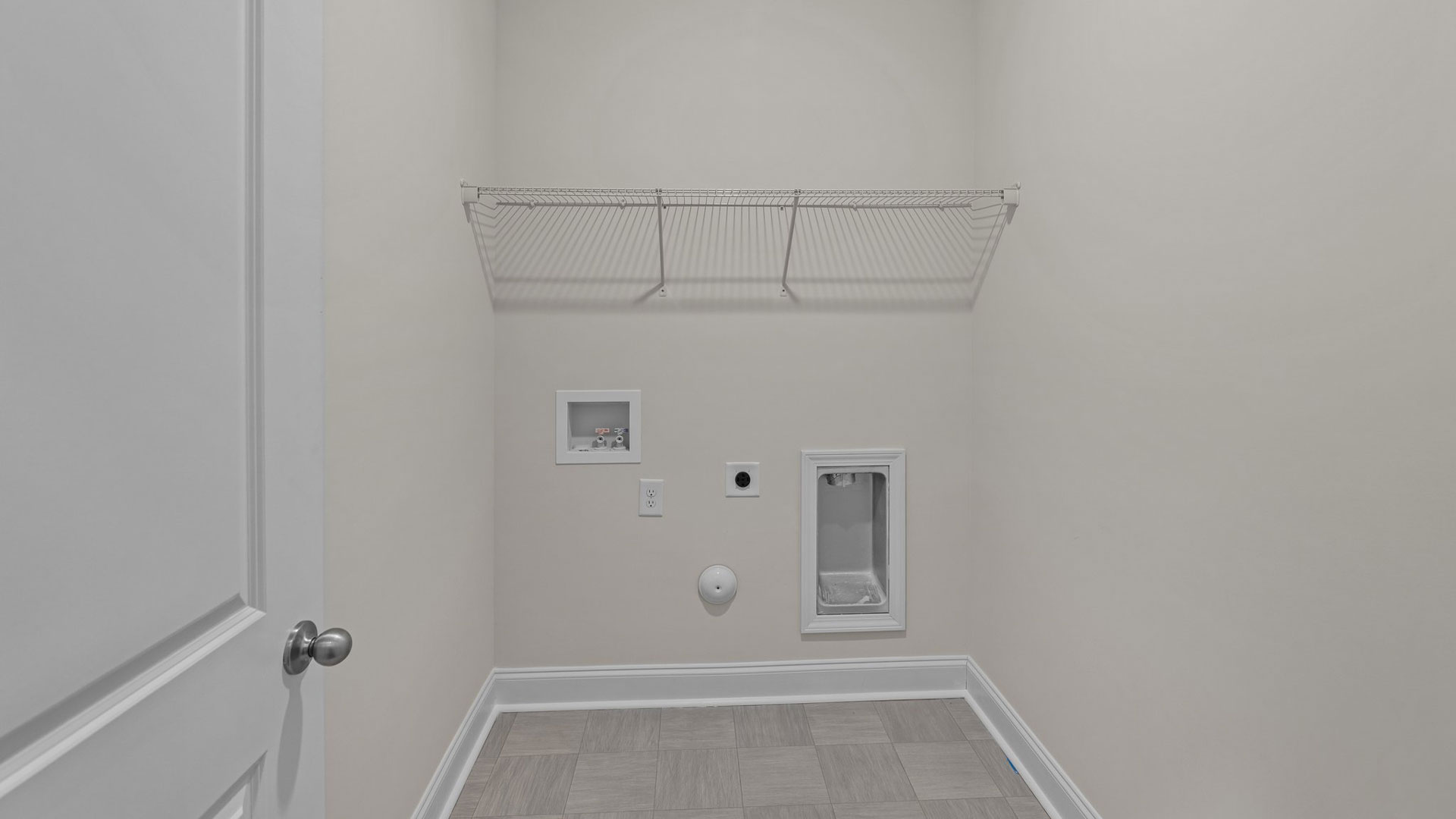laundry room with wire shelving