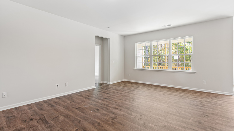 living room with revwood flooring