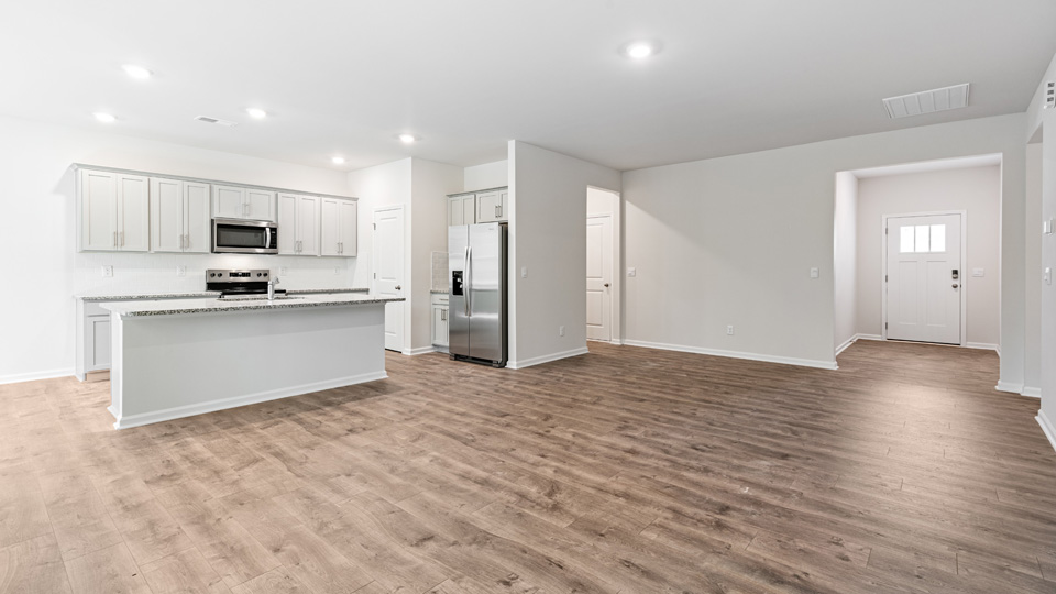 living room with revwood flooring