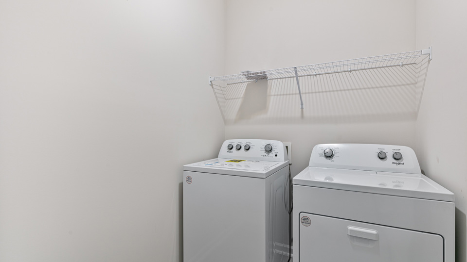 laundry room with wire shelving
