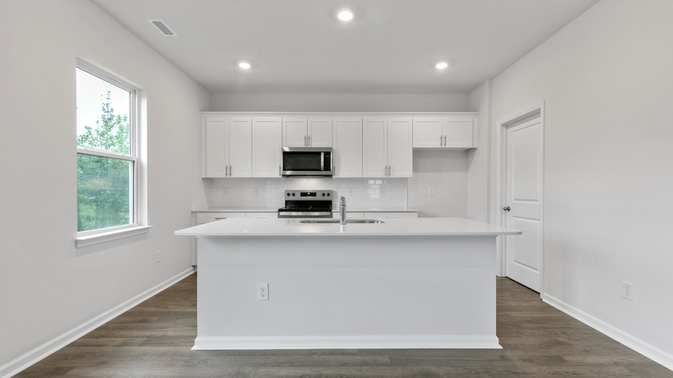Kitchen with white cabinets