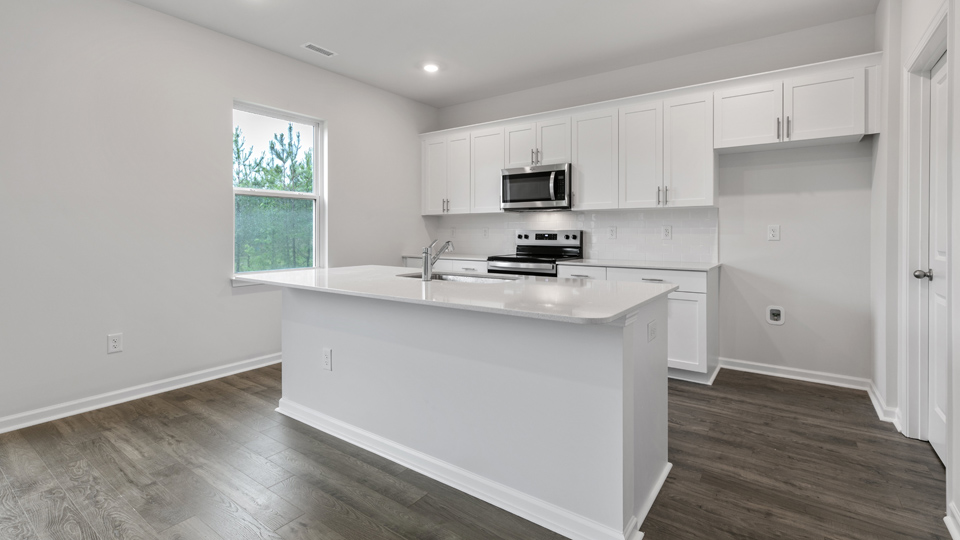 Kitchen with white cabinets