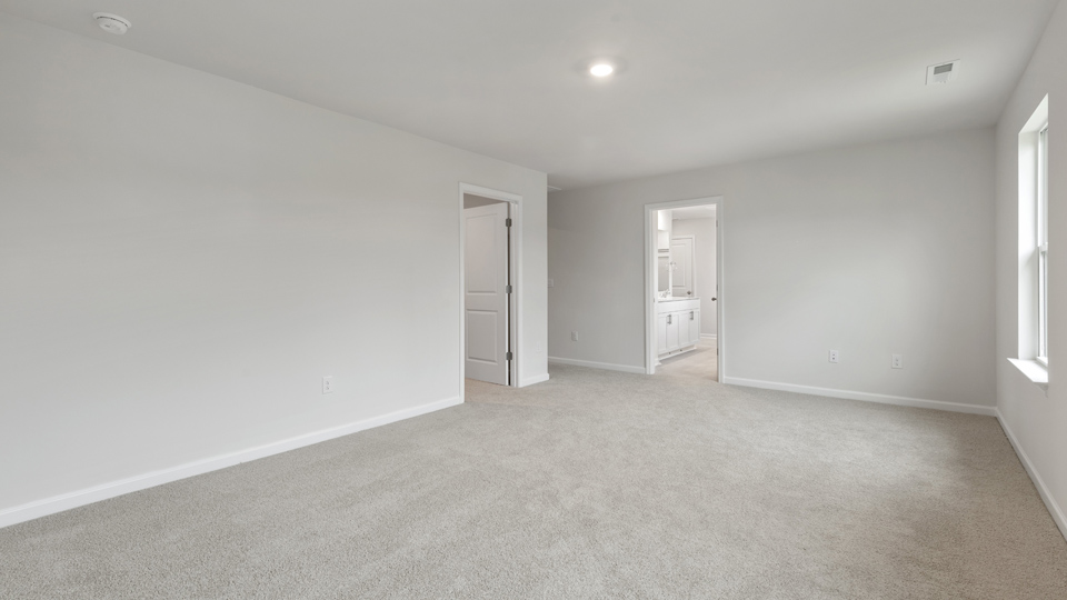 Bedroom with carpet flooring