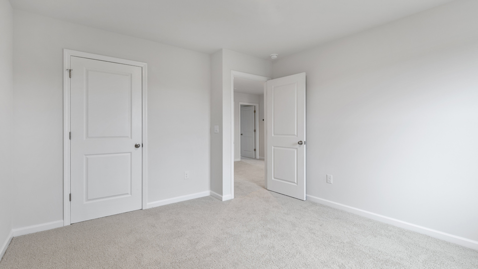 Bedroom with carpet flooring