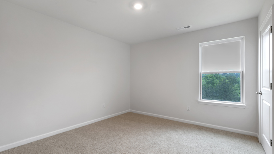 Bedroom with carpet flooring