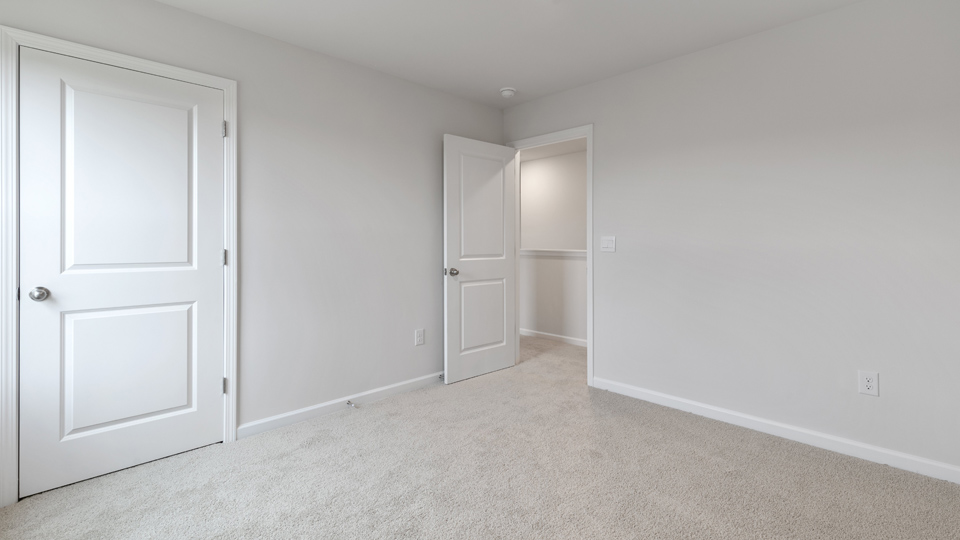 Bedroom with carpet flooring