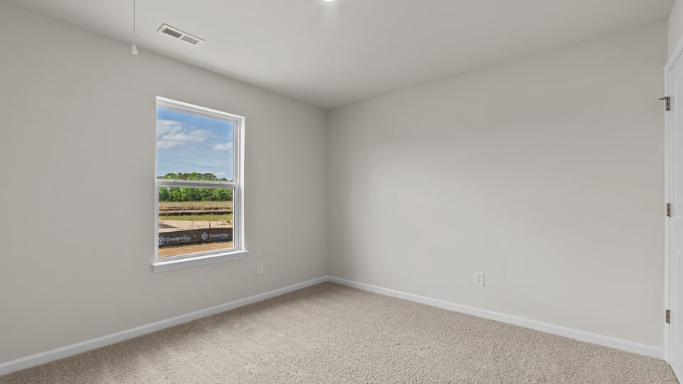 Bedroom with carpet flooring