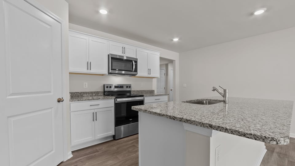 Kitchen with white cabinets