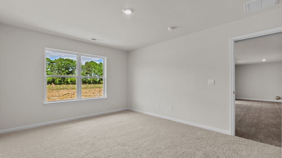 Bedroom with carpet flooring