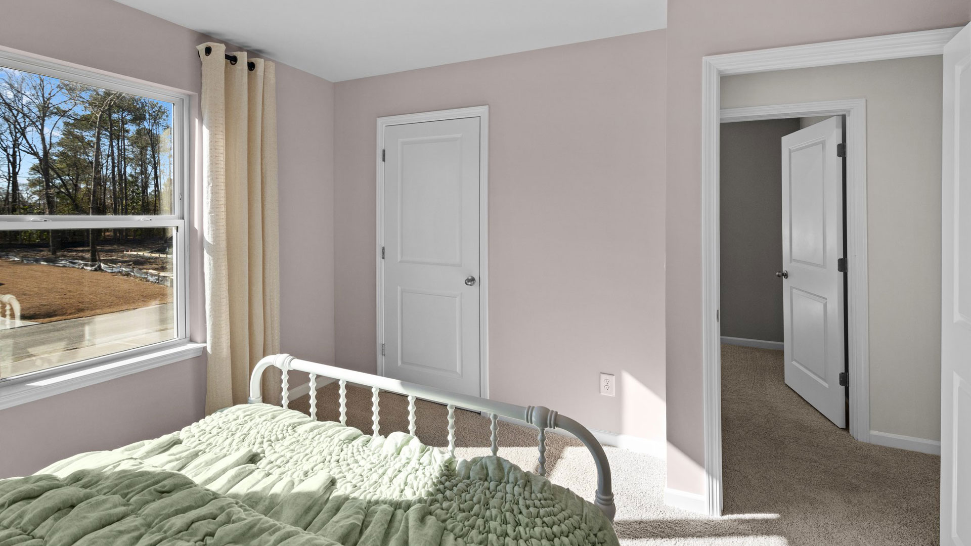 Bedroom with carpet flooring