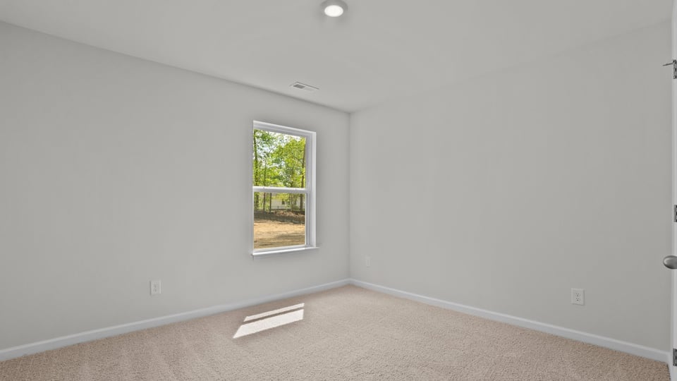 Bedroom with carpet flooring